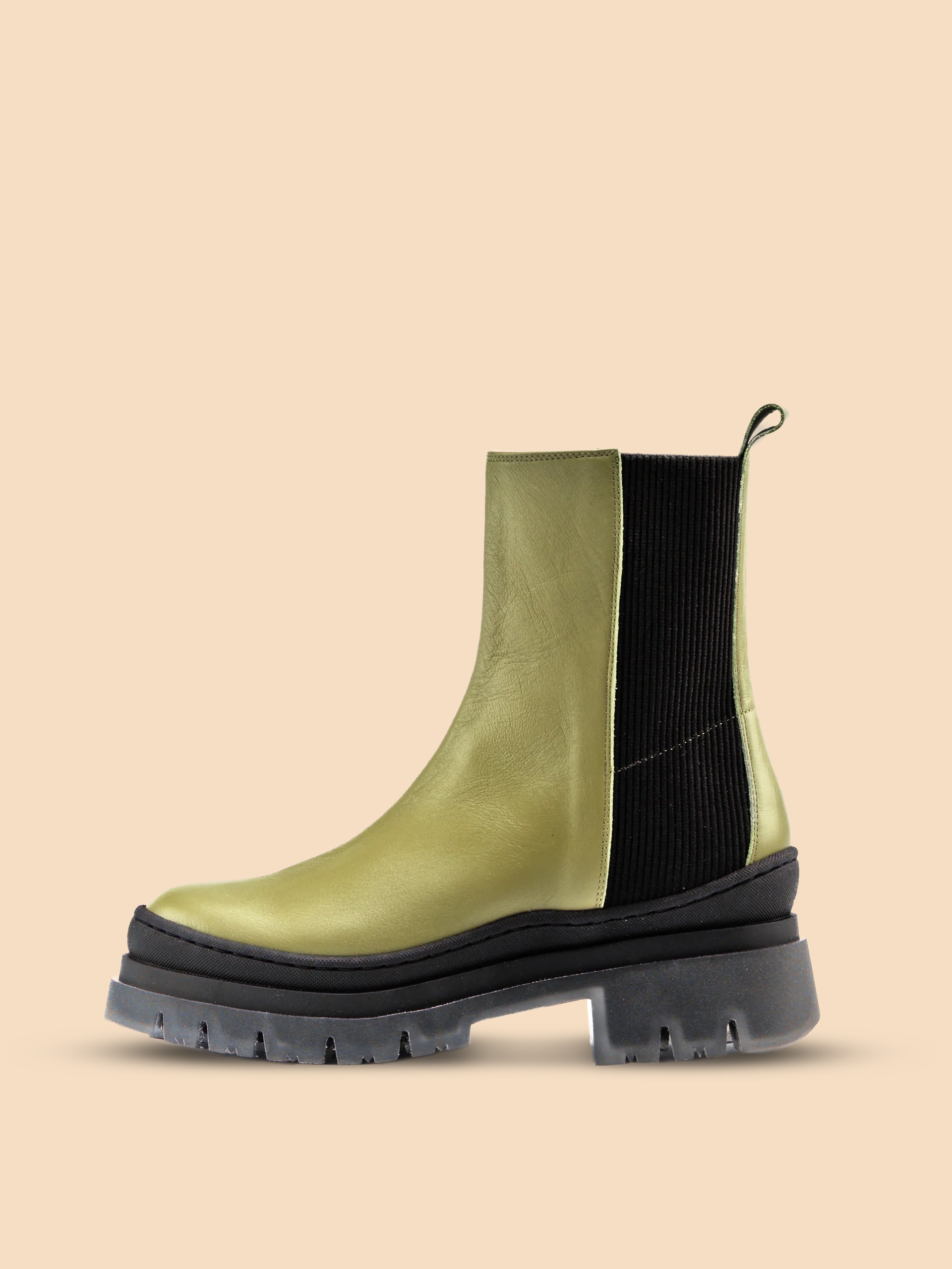 A green and black leather boot