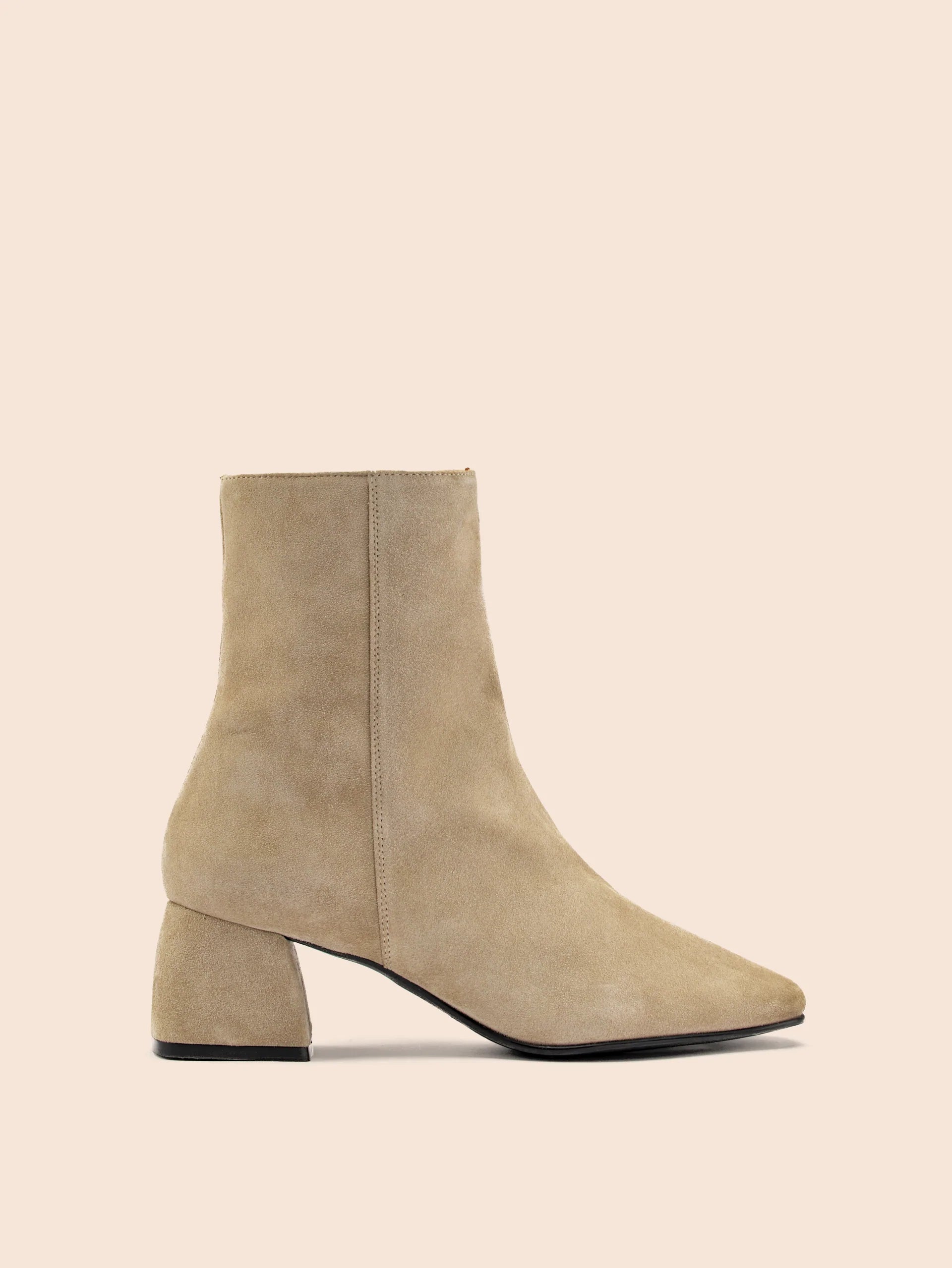 A beige suede boot