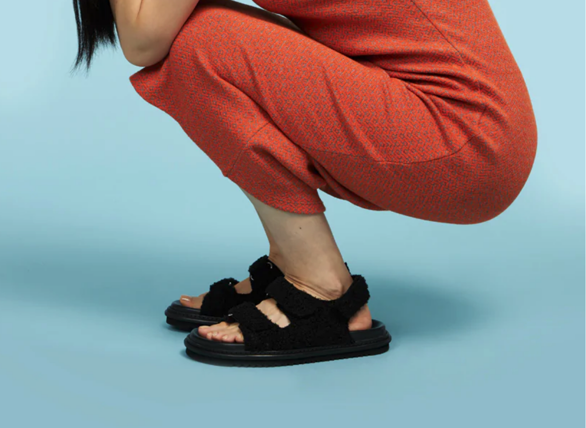 Close up on the black Caserta sandals.